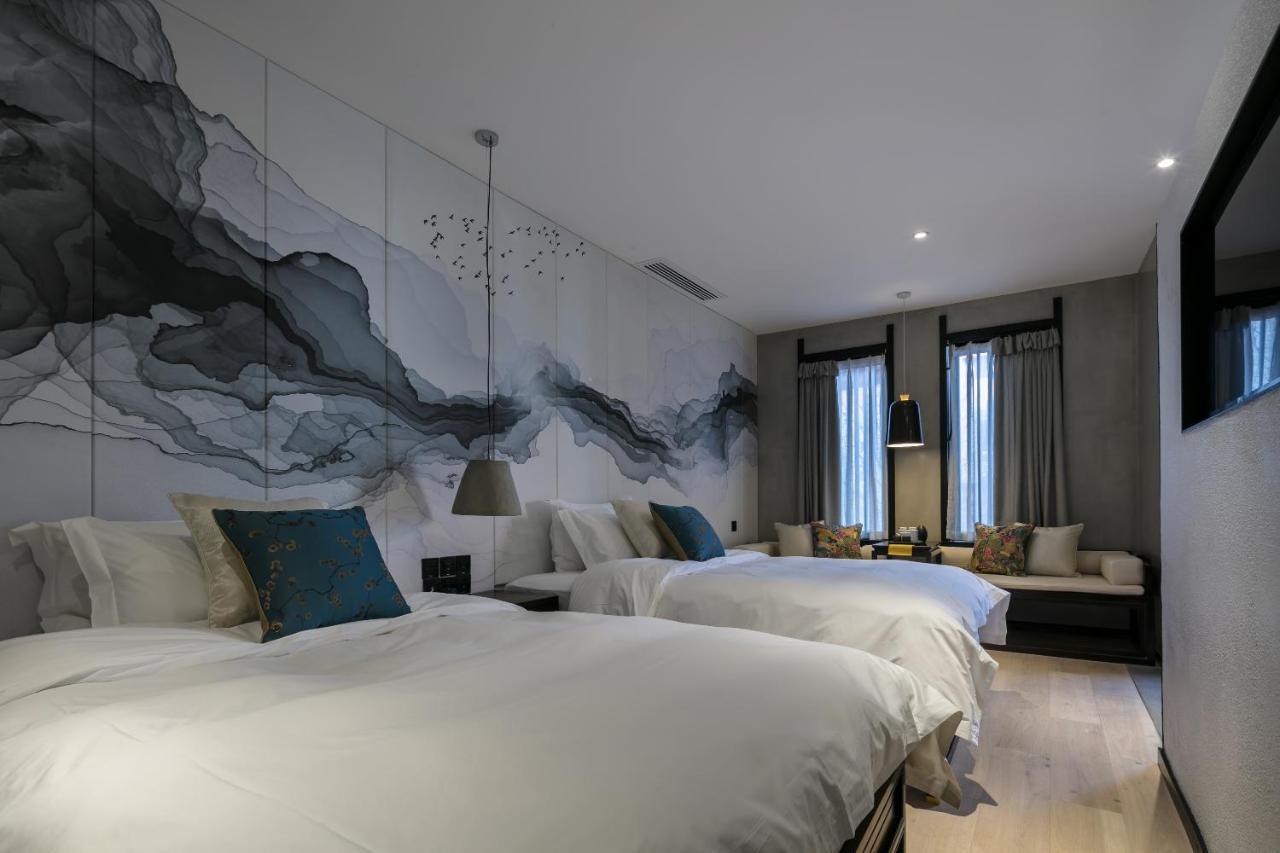 Lijiangl Hotel Liman Shenmiji Inn Лицзян Экстерьер фото