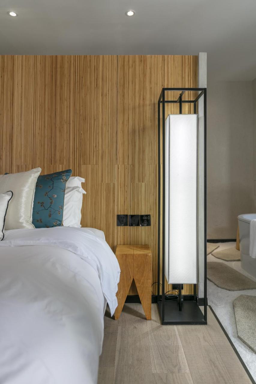 Lijiangl Hotel Liman Shenmiji Inn Лицзян Экстерьер фото