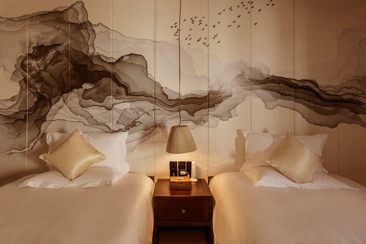 Lijiangl Hotel Liman Shenmiji Inn Лицзян Экстерьер фото