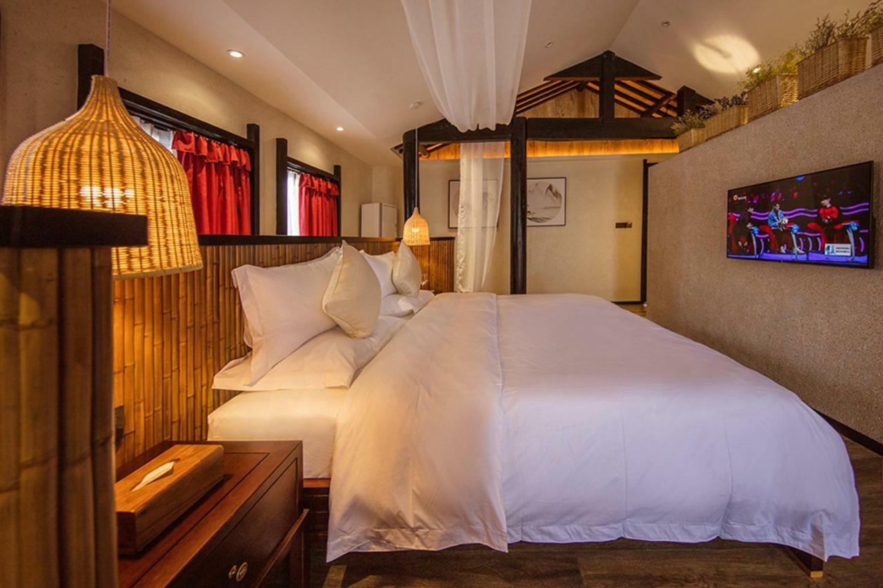 Lijiangl Hotel Liman Shenmiji Inn Лицзян Экстерьер фото