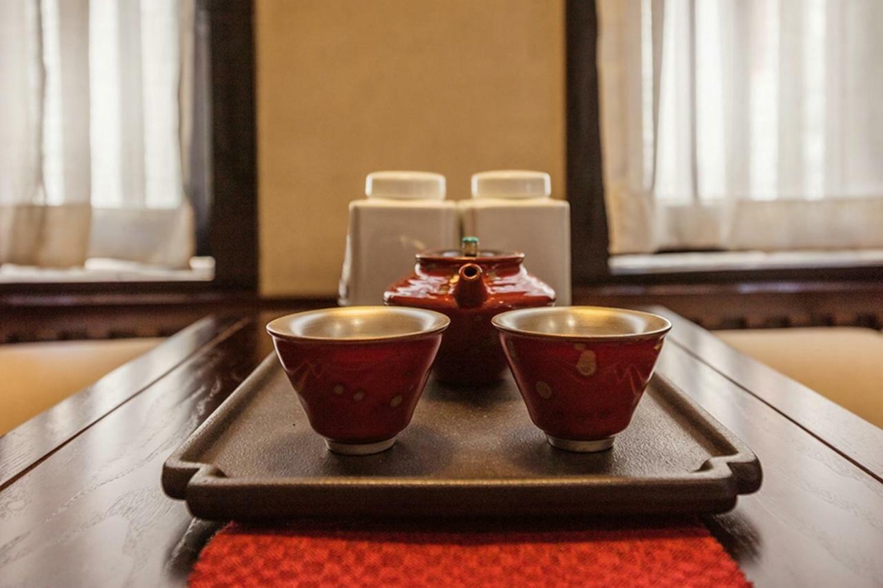 Lijiangl Hotel Liman Shenmiji Inn Лицзян Экстерьер фото